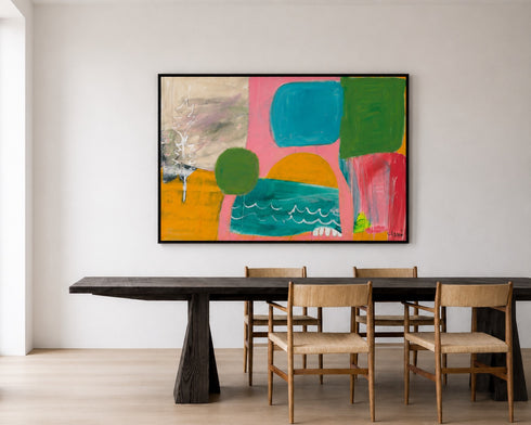 Kerri Rosenthal abstract art print hanging above a wood dining table
