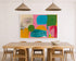 Kerri Rosenthal abstract art print in black frame with teal, green, and coral color blocks