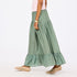 Women's amalfi green tiered maxi skirt side view. Shop Kerri Rosenthal skirts