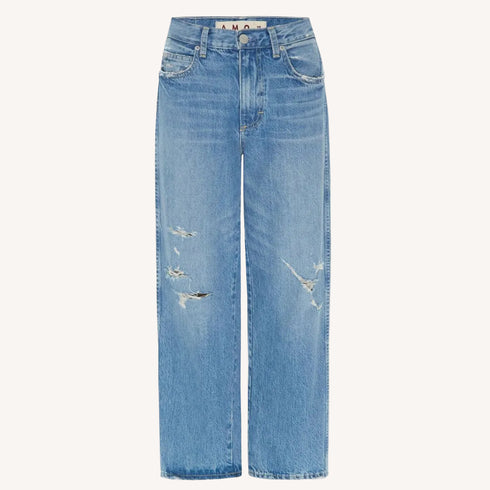 Cropped, wide, straight leg with an easy fit, mid-rise, The Amo Billie Jean is a relaxed look with distressed, ripped details in light blue denim wash.