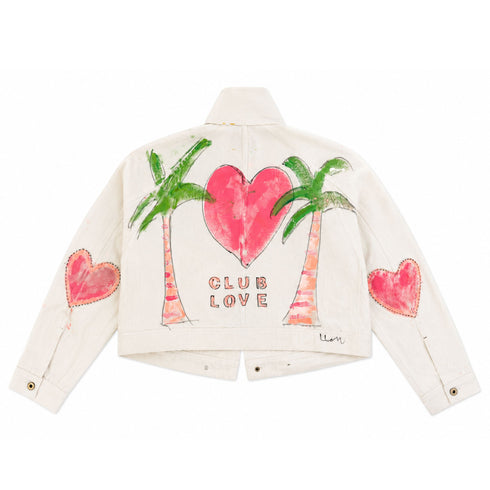 White denim cropped denim jacket hand-painted on the back with a pink heart between two green palm trees, 'Club Love' text below, and heart outlines on both sleeves — Kerri Rosenthal wearable art