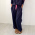 Weekend Barb indigo blue sweatpants made from 100% cotton with side pockets and a tiny embroidered heart - Shop cute women’s sweatpants by Kerri Rosenthal
