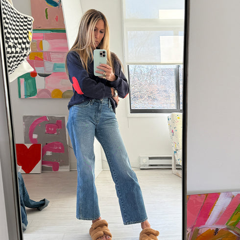 The Benton Imperfect heart patch elbow sleeve indigo blue sweatshirt is made from 100% cotton fleece - Shop cute women’s sweatshirts by Kerri Rosenthal