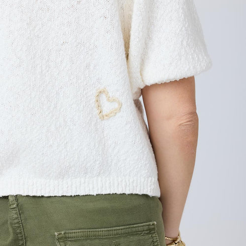 Cream colored cardigan with heart embroidery - Shop women’s cute sweaters by Kerri Rosenthal.