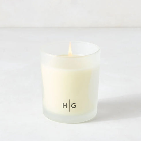 Available at Kerri Rosenthal sun-dried driftwood, California white oak, and cypress. The Hudson Grace Brentwood candle brings warm coastal calm to any room. Hand-poured in the USA with 100% soy wax. 60-hour burn. Beautifully gift boxed.