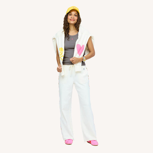 SoulCycle x KR Soul Brigade charcoal grey tank top with a tiny skull and off white sweatpant by Kerri Rosenthal