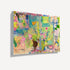 Side angle view of unframed abstract mixed-media canvas art, showing gallery-wrap texture with pastel colors and layered floral details