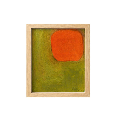 Framed abstract artwork with a red circle on a green background