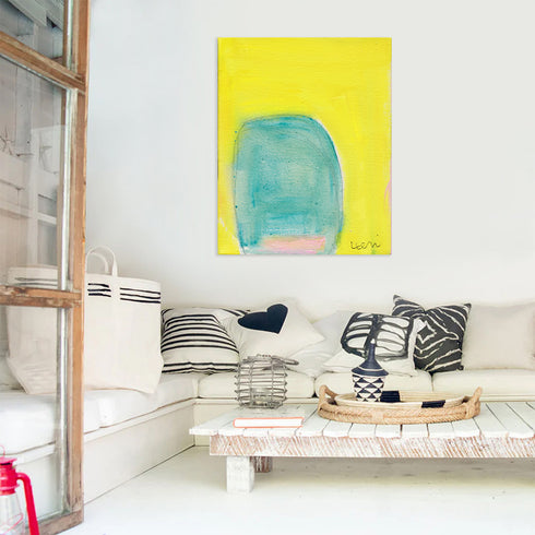 Color Note 4 multicolor wall art print with black and white square throw pillows on couch by Kerri Rosenthal