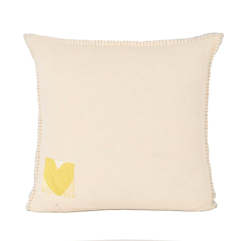 Core Imperfect Heart Throw Pillow in camel color with cream and yellow heart design and grey stitching. Cute decorative pillows for home decor made with cotton cashmere by Kerri Rosenthal. Square size.