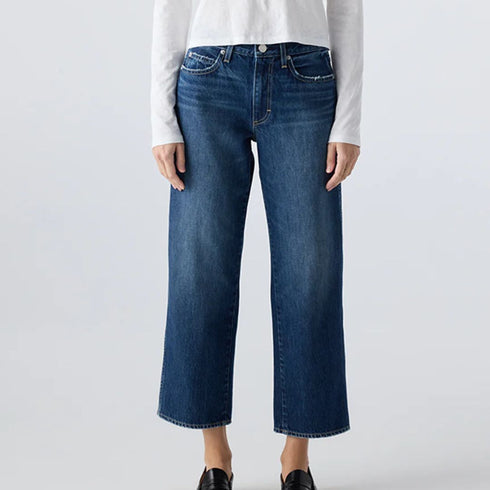 The Billie Jean is a mid-rise, cropped, wide, straight-leg jeans with an easy fit. A relaxed look, with distressing, dark 100% cotton rigid denim. Made in USA.