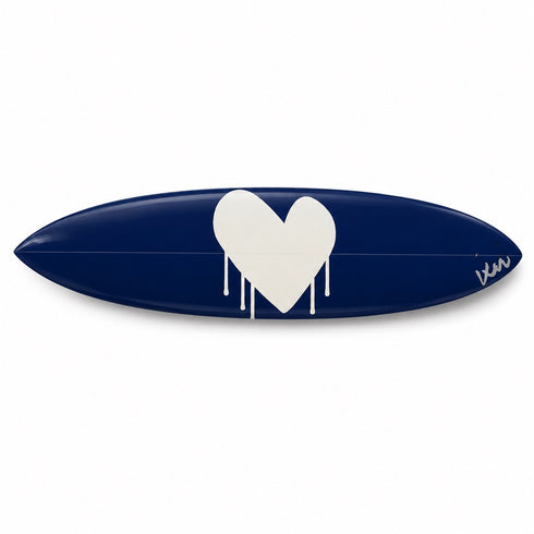Kerri Rosenthal navy surfboard with hand-painted white drip heart and signature