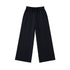 Flat lay of black pinstripe pants.