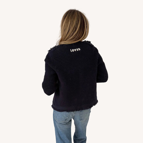 Fringe beau-lero open front indigo blue cardigan made in 100% cotton with "Loved" artwork by Kerri Rosenthal