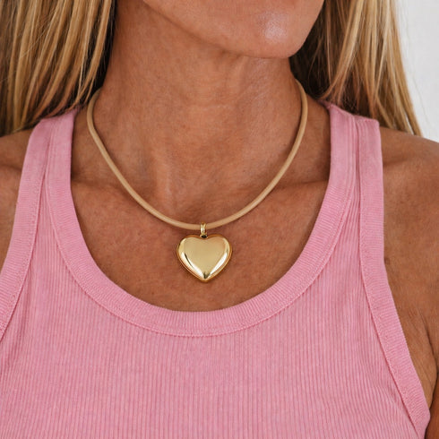 Puff heart necklace with plush gold heart pendant and genuine leather cord by Kerri Rosenthal