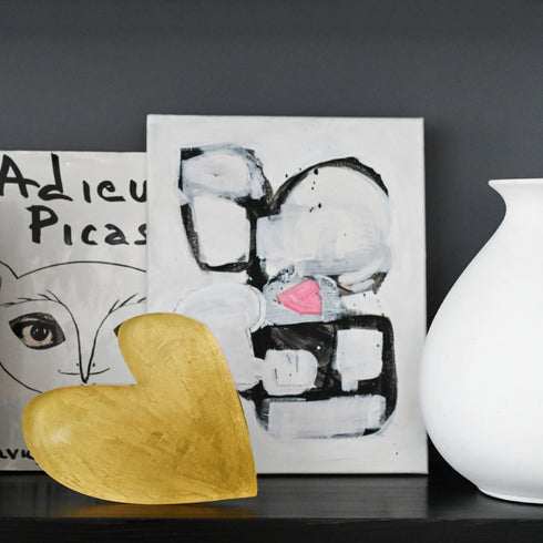 Imperfect Heart Rock of Love in gold acrylic mini art by Kerri Rosenthal on shelf