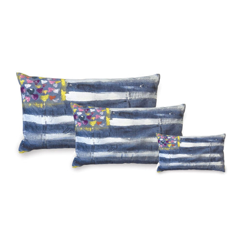 Set of three decorative pillows with blue and white pattern on a white background