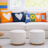Reverse White Heart Throw Pillow with bright orange and navy background in square by Kerri Rosenthal. Cute colorful throw pillows for couch, featuredf with Soliel LOVE lumbar pillow.