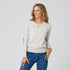 Women's crewneck cashmere sweater with pink heart elbow patches, 100% lightweight cashmere, designed by Kerri Rosenthal