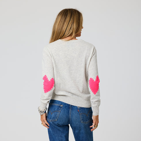 Women's crewneck cashmere sweater with pink heart elbow patches, 100% lightweight cashmere, designed by Kerri Rosenthal