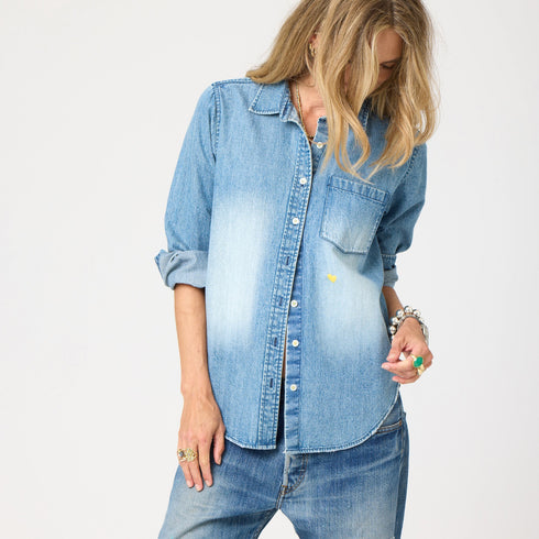 Blue denim long sleeve button-up shirt with heart elbow patches. Cute designer shirts by Kerri Rosenthal