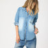 Blue denim long sleeve button-up shirt with heart elbow patches. Cute designer shirts by Kerri Rosenthal