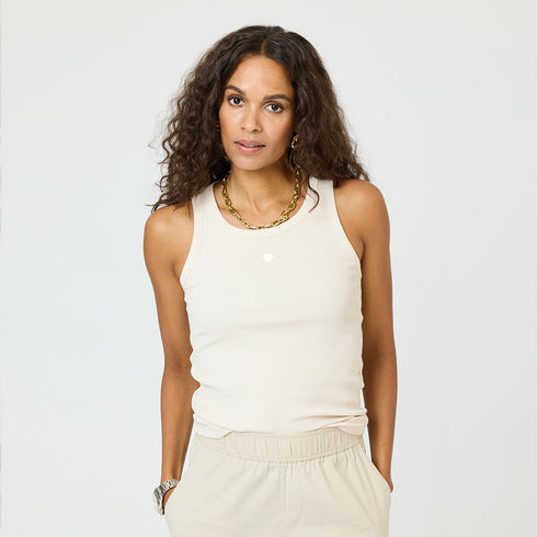 KR sand tank with white tiny embroidered heart with crew neck and sleeveles made of cotton spandex blend - Cute designer women's tank tops by Kerri Rosenthal