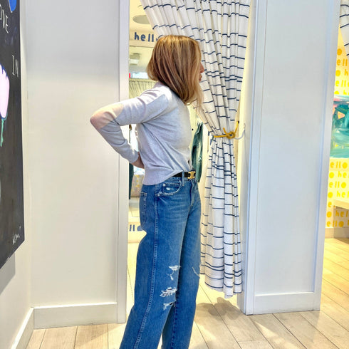 Grey patchwork crewneck sweater with imperfect heart patches on elbows in a soft cotton-cashmere blend. Cute women's sweaters by Kerri Rosenthal