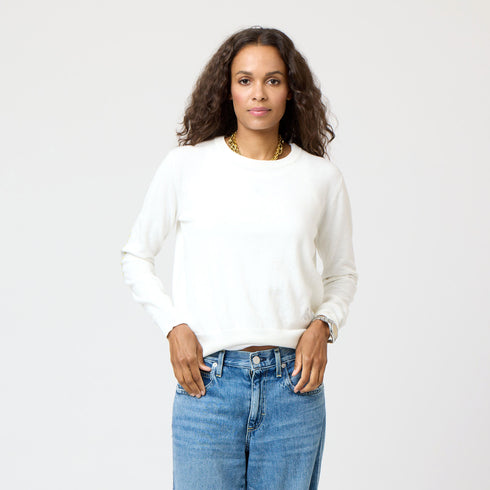 White Patchwork Crew Neck Sweater with imperfect heart patches on elbows in a soft cotton-cashmere blend. Cute women's sweaters by Kerri Rosenthal