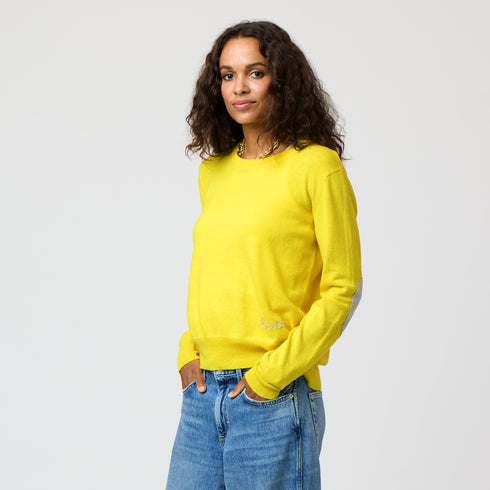 Yellow Patchwork Crew Neck Sweater with imperfect heart patches on elbows in a soft cotton-cashmere blend. Cute women's sweaters by Kerri Rosenthal