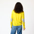 Yellow Patchwork Crew Neck Sweater with imperfect heart patches on elbows in a soft cotton-cashmere blend. Cute women's sweaters by Kerri Rosenthal