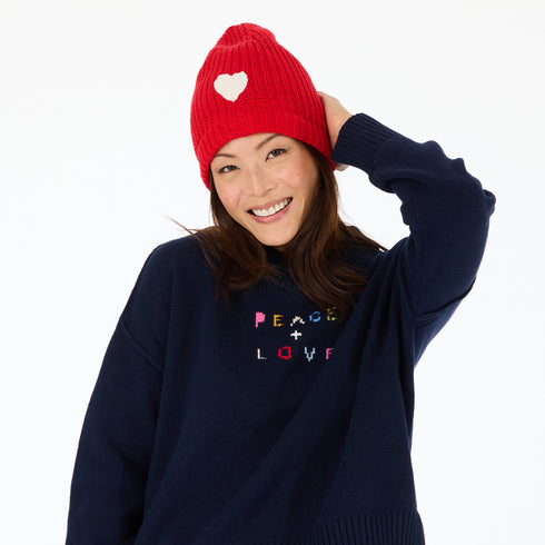 Love cherri red beanie in a cotton-cashmere blend with a white heart patch - Shop cute women’s beanies hats by Kerri Rosenthal