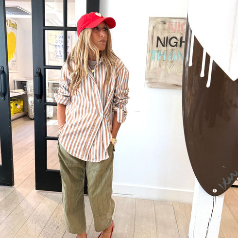 Jack blue and brown striped cotton flannel button-up shirt with heart embroidery and long sleeves. Shop women's button-up shirts by Kerri Rosenthal