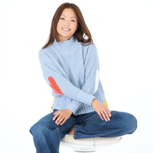 Marlow imperfect heart sweater in steel blue 100% cotton with a soft mock-neck and heart patchwork elbow - Shop cute women’s sweater by Kerri Rosenthal
