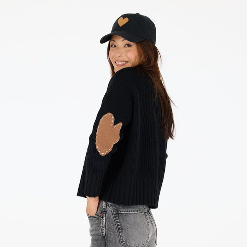 The marlow imperfect heart elbow patches on a black cotton sweater with a mock neck - Shop women's sweaters with hearts by Kerri Rosenthal