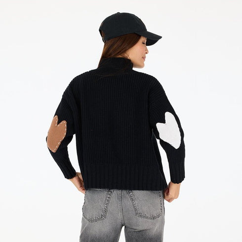 The marlow imperfect heart elbow patches on a black cotton sweater with a mock neck - Shop women's sweaters with hearts by Kerri Rosenthal
