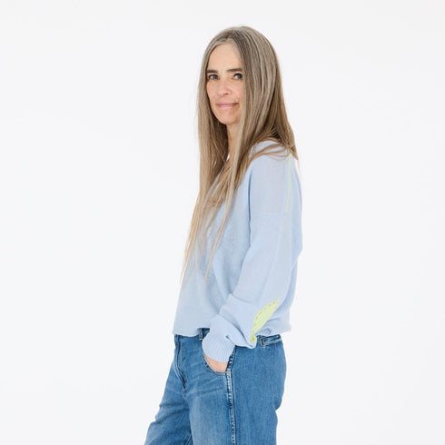 Steel Blue Lightweight V neck sweater in cashmere with contrast stitching and romantic sleeve text
