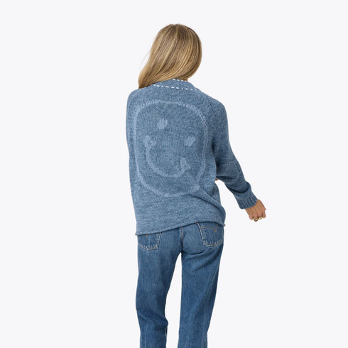 Blue womens cardigan with tonal smiley face graphic and contrast elbow patches