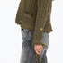 Army green cotton cardigan sweater fringe trim tonal imperfect heart artwork cable knit body and button front closure.