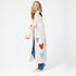 100% Cashmere long cardigan sweater duster with multicolored hand-stitched imperfect heart appliqués, front patch pockets, and ribbed cuffs.