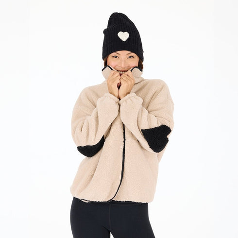 Soft and stylish teddy fleece camel jacket featuring contrast trim and heart elbow details