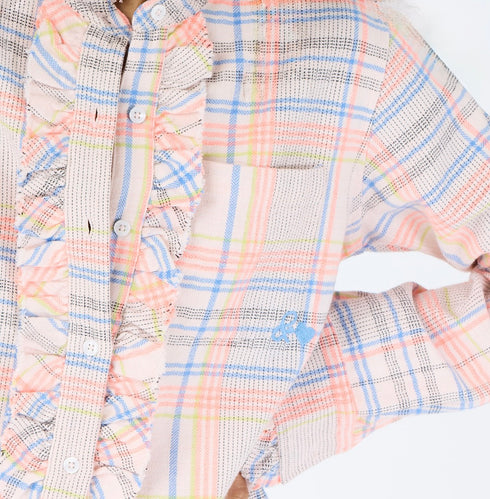 The Molly multicolor plaid flannel shirt is made from 100% cotton with a ruffle front, collar and long sleeves - Shop cute women’s shirts by Kerri Rosenthal.