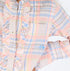 The Molly multicolor plaid flannel shirt is made from 100% cotton with a ruffle front, collar and long sleeves - Shop cute women’s shirts by Kerri Rosenthal.