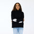 The Lucy mock-neck black sweater is made from a cashmere blend with heart patch elbows - Shop cute women’s sweaters by Kerri Rosenthal