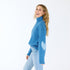 The Lucy mock-neck blue sweater is made from a cashmere blend with heart patch elbows - Shop cute women’s sweaters by Kerri Rosenthal