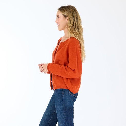Bassett rust cashmere cardigan, features a round neck, covered contrast buttons, and embroidered 'Loved' artwork - Cute women's cardigans by Kerri Rosenthal