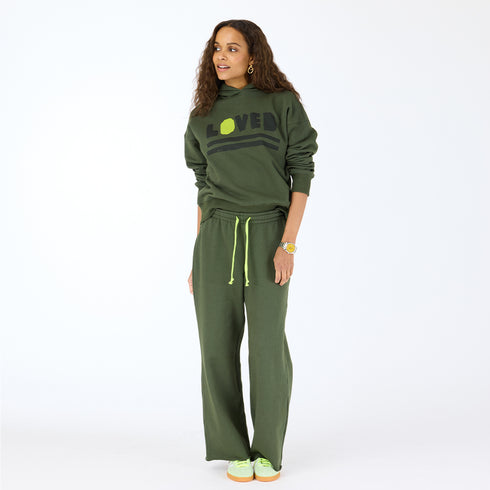 The Weekend Barb pine green sweatpant made from 100% cotton with side pockets and a tiny embroidered heart - Shop cute women’s sweatpants by Kerri Rosenthal