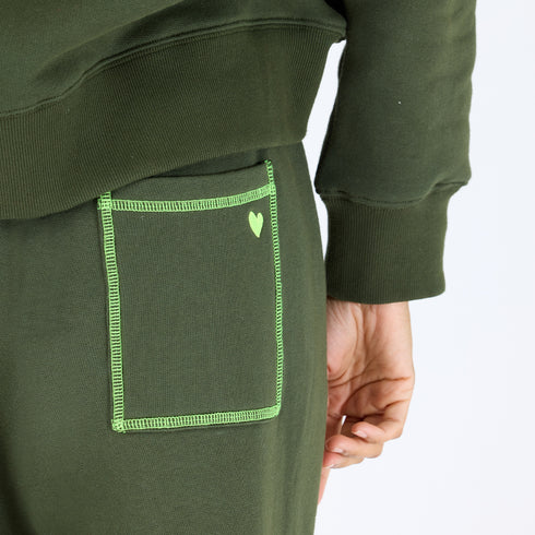 The Weekend Barb pine green sweatpant made from 100% cotton with side pockets and a tiny embroidered heart - Shop cute women’s sweatpants by Kerri Rosenthal