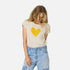 Suke imperfect heart off-white tee in 100% cotton with a yellow heart - Shop women's cute tees by Kerri Rosenthal