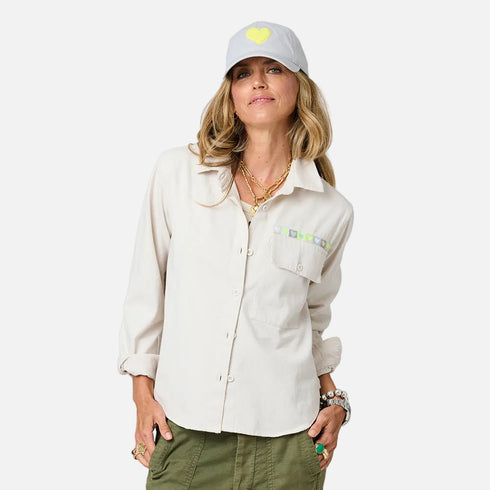 Pia love brigade button-front off white shirt in 100% cotton twill with grey baseball cat hat by Kerri Rosenthal
